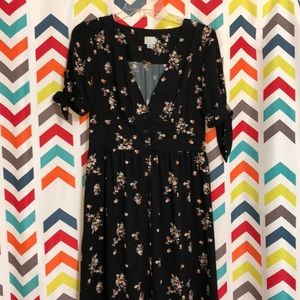 Woman’s black dress with floral print